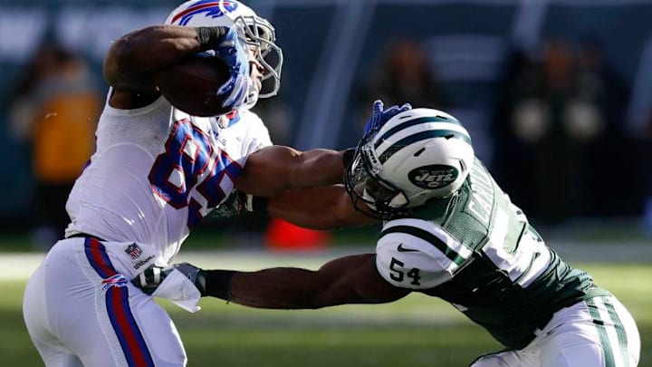 EAST RUTHERFORD, NJ - JANUARY 01: Charles Clay #85 of the Buffalo Bills grapples with Bruce Carter #54 of the New York Jets at MetLife Stadium on January 1, 2017 in East Rutherford, New Jersey. (Photo by Jeff Zelevansky/Getty Images)