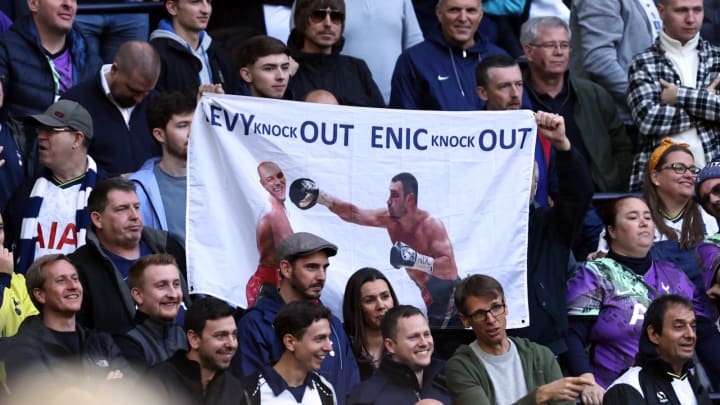 LONDON, ENGLAND - OCTOBER 03: Tottenham Hotspur fans hold a banner protesting against Chairman Daniel Levy and ENIC group during the Premier League match between Tottenham Hotspur and Aston Villa at Tottenham Hotspur Stadium on October 2, 2021 in London, England. (Photo by Marc Atkins/Getty Images)
