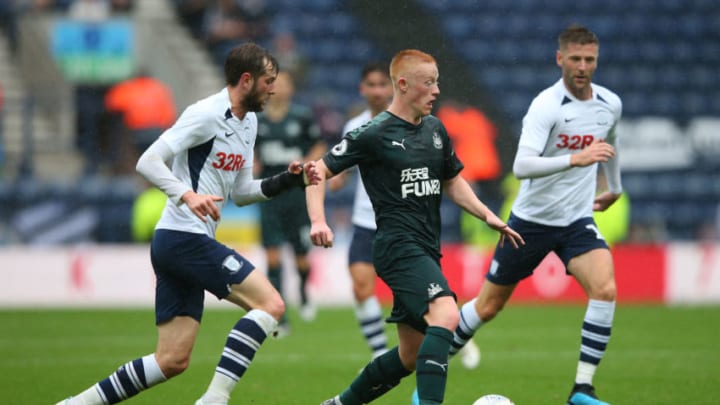 PRESTON, ENGLAND - JULY 27: Matty Longstaff of Newcastle United beats Tom Barkhuizen of Preston North End during a pre-season friendly match between Preston North End and Newcastle United at Deepdale on July 27, 2019 in Preston, England. (Photo by Alex Livesey/Getty Images)