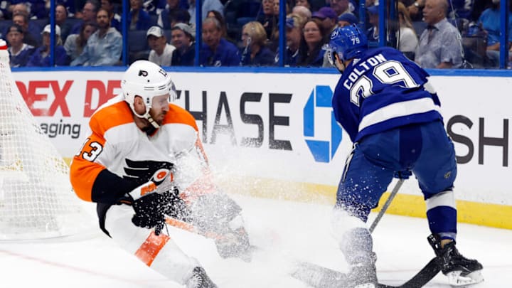 Oct 18, 2022; Tampa, Florida, USA; Philadelphia Flyers center Kevin Hayes (13) defends Tampa Bay Lightning center Ross Colton (79) during the third period at Amalie Arena. Mandatory Credit: Kim Klement-USA TODAY Sports