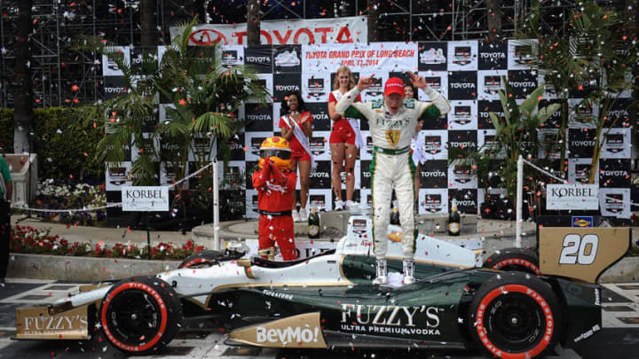 LONG BEACH, CA - APRIL 13: Mike Conway of England, driver of the #20 Ed Carpenter Racing Dallara Chevrolet, celebrates after winning the Verizon IndyCar Series Toyota Grand Prix of Long Beach on April 13, 2014 on the streets of Long Beach, California. (Photo by Jonathan Moore/Getty Images)