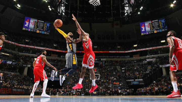 MEMPHIS, TN – DECEMBER 15: Mike Conley #11 of the Memphis Grizzlies shoots the ball against the Houston Rockets on December 15, 2018 at FedExForum in Memphis, Tennessee. NOTE TO USER: User expressly acknowledges and agrees that, by downloading and or using this photograph, User is consenting to the terms and conditions of the Getty Images License Agreement. Mandatory Copyright Notice: Copyright 2018 NBAE (Photo by Joe Murphy/NBAE via Getty Images)