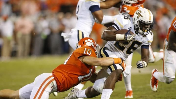 Sep 22, 2016; Atlanta, GA, USA; Clemson Tigers linebacker Ben Boulware (10) tackles Georgia Tech Yellow Jackets running back Dedrick Mills (26) in the fourth quarter at Bobby Dodd Stadium. Clemson defeated Georgia Tech 26-7. Mandatory Credit: Brett Davis-USA TODAY Sports