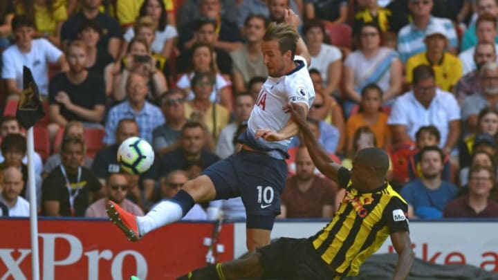 Tottenham Hotspur's English striker Harry Kane (L) vies with Watford's Zaire-born Belgian defender Christian Kabasele (R) during the English Premier League football match between Watford and Tottenham Hotspur at Vicarage Road Stadium in Watford, north of London on September 2, 2018. (Photo by OLLY GREENWOOD / AFP) / RESTRICTED TO EDITORIAL USE. No use with unauthorized audio, video, data, fixture lists, club/league logos or 'live' services. Online in-match use limited to 120 images. An additional 40 images may be used in extra time. No video emulation. Social media in-match use limited to 120 images. An additional 40 images may be used in extra time. No use in betting publications, games or single club/league/player publications. / (Photo credit should read OLLY GREENWOOD/AFP/Getty Images)
