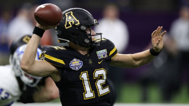 NEW ORLEANS, LOUISIANA - DECEMBER 15: Zac Thomas #12 of the Appalachian State Mountaineers looks to throw a pass against the Middle Tennessee Blue Raiders during the R&L Carriers New Orleans Bowl at the Mercedes-Benz Superdome on December 15, 2018 in New Orleans, Louisiana. (Photo by Chris Graythen/Getty Images)