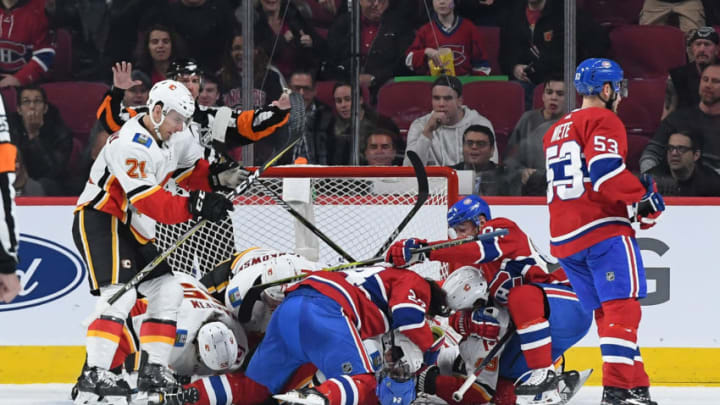 MONTREAL, QC - OCTOBER 23: Montreal Canadiens' players get into a scrum with Calgary Flames' players in the NHL game at the Bell Centre on October 23, 2018 in Montreal, Quebec, Canada. (Photo by Francois Lacasse/NHLI via Getty Images)