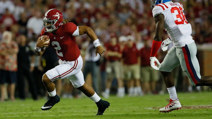TUSCALOOSA, AL – SEPTEMBER 30: Jalen Hurts #2 of the Alabama Crimson Tide rushes away from Marquis Haynes #38 of the Mississippi Rebels at Bryant-Denny Stadium on September 30, 2017 in Tuscaloosa, Alabama. (Photo by Kevin C. Cox/Getty Images)