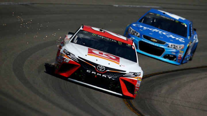 RICHMOND, VA - APRIL 30: Matt Kenseth, driver of the #20 Circle K Toyota, leads Kyle Larson, driver of the #42 Credit One Bank Chevrolet, during the Monster Energy NASCAR Cup Series Toyota Owners 400 at Richmond International Raceway on April 30, 2017 in Richmond, Virginia. (Photo by Sarah Crabill/Getty Images)