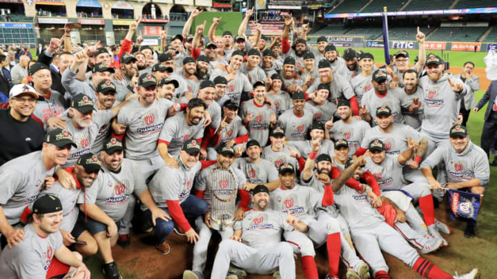 HOUSTON, TEXAS - OCTOBER 30: The Washington Nationals pose for a team photo as they celebrate after defeating the Houston Astros in Game Seven to win the 2019 World Series at Minute Maid Park on October 30, 2019 in Houston, Texas. The Washington Nationals defeated the Houston Astros with a score of 6 to 2. (Photo by Mike Ehrmann/Getty Images)