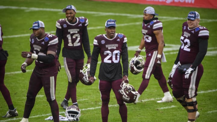 Dec 31, 2020; Fort Worth, TX, USA; The Mississippi State Bulldogs celebrate the win over the the Tulsa Golden Hurricane after the game at Amon G. Carter Stadium. Mandatory Credit: Jerome Miron-USA TODAY Sports