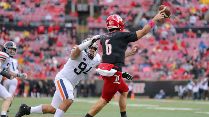 LOUISVILLE, KY - OCTOBER 26: Louisville Cardinals quarterback Evan Conley (6) throws a pass as Virginia Cavaliers defensive lineman Aaron Faumui (94) applies pressure during the college football game between the Virginia Cavaliers and Louisville Cardinals on October 26, 2019, at Cardinal Stadium in Louisville, KY. (Photo by Frank Jansky/Icon Sportswire via Getty Images)