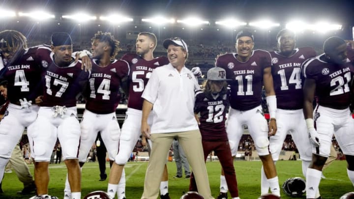 COLLEGE STATION, TX – AUGUST 30: Texas A&M Aggies head coach Jimbo Fisher celebrates with his team after defeating the Northwestern State Demons in a football game at Kyle Field on August 30, 2018, in College Station, Texas. (Photo by Cooper Neill/Getty Images)