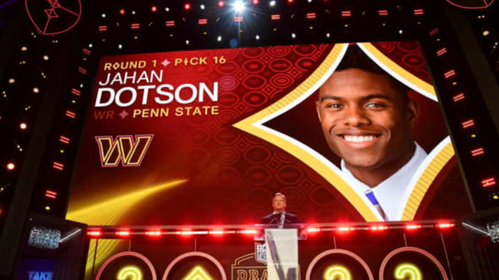 Apr 28, 2022; Las Vegas, NV, USA; Penn State wide receiver Jahan Dotson is announced as the sixteenth overall pick to the Washington Commanders by NFL commissioner Roger Goodell during the first round of the 2022 NFL Draft at the NFL Draft Theater. Mandatory Credit: Gary Vasquez-USA TODAY Sports