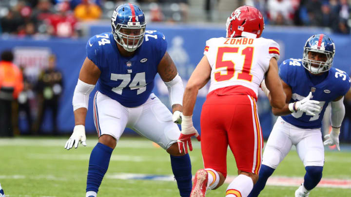 EAST RUTHERFORD, NJ - NOVEMBER 19: Ereck Flowers #74 of the New York Giants defends against Frank Zombo #51 of the Kansas City Chiefs during their game at MetLife Stadium on November 19, 2017 in East Rutherford, New Jersey. (Photo by Al Bello/Getty Images)