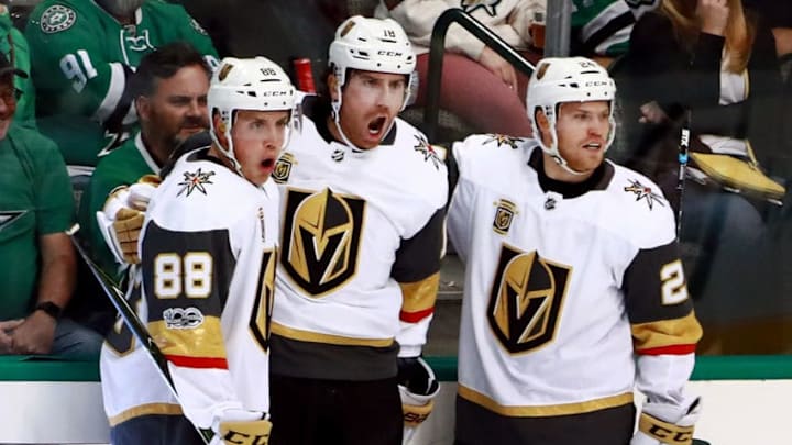 DALLAS, TX - OCTOBER 06: James Neal #18 of the Vegas Golden Knights celebrates with Nate Schmidt #88 of the Vegas Golden Knights and Oscar Lindberg #24 of the Vegas Golden Knights after scoring the first goal in team history against the Dallas Stars at American Airlines Center on October 6, 2017 in Dallas, Texas. (Photo by Tom Pennington/Getty Images)