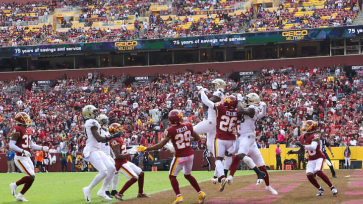 LANDOVER, MARYLAND - OCTOBER 10: Marquez Callaway #1 of the New Orleans Saints catches a hail mary pass for a touchdown during the first half against the Washington Football Team at FedExField on October 10, 2021 in Landover, Maryland. (Photo by Rob Carr/Getty Images)