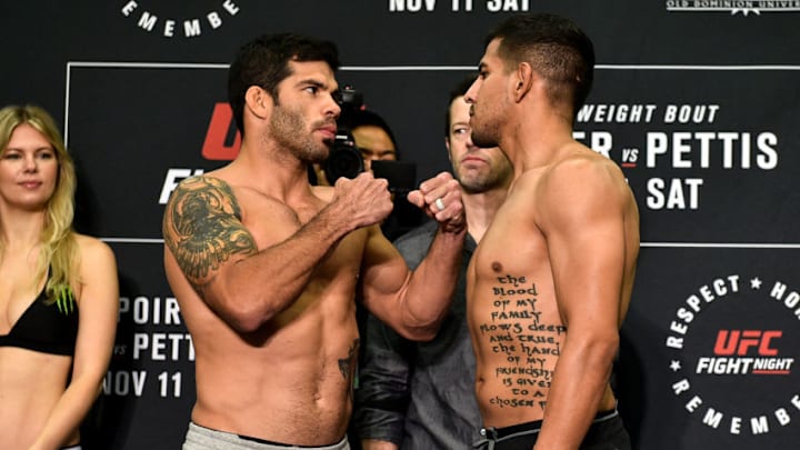 NORFOLK, VA - NOVEMBER 10: (L-R) Raphael Assuncao of Brazil and Matthew Lopez face off during the UFC Fight Night Weigh-in on November 10, 2017 in Norfolk, Virginia. (Photo by Brandon Magnus/Zuffa LLC/Zuffa LLC via Getty Images)