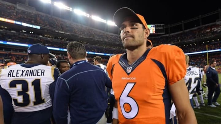 Aug 27, 2016; Denver, CO, USA; Denver Broncos quarterback Mark Sanchez (6) leaves the field following the win over the Los Angeles Rams at Sports Authority Field at Mile High. The Broncos defeated the Rams 17-9. Mandatory Credit: Ron Chenoy-USA TODAY Sports