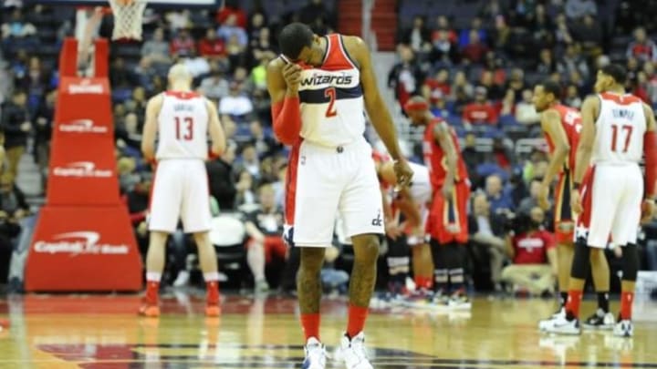 Feb 23, 2016; Washington, DC, USA; Washington Wizards guard John Wall (2) reacts against the New Orleans Pelicans during the first half at Verizon Center. Mandatory Credit: Brad Mills-USA TODAY Sports