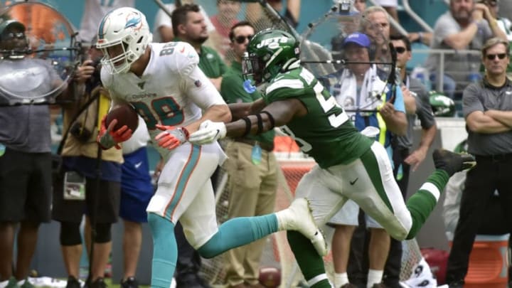 MIAMI, FL - NOVEMBER 03: Mike Gesicki #88 of the Miami Dolphins runs after making a catch in the second quarter against the New York Jets at Hard Rock Stadium on November 3, 2019 in Miami, Florida. (Photo by Eric Espada/Getty Images)