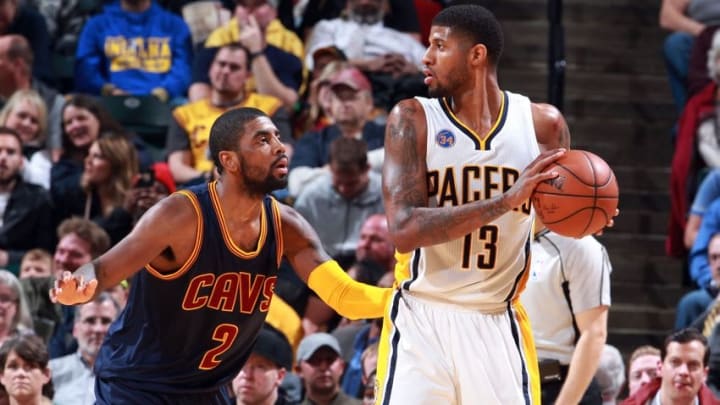 Apr 6, 2016; Indianapolis, IN, USA; Indiana Pacers forward Paul George (13) is guarded by Cleveland Cavaliers guard Kyrie Irving (2) during the second half at Bankers Life Fieldhouse. Indiana defeats Cleveland 123-109. Mandatory Credit: Brian Spurlock-USA TODAY Sports