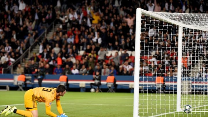 Real Madrid's Belgian goalkeeper Thibaut Courtois reacts after Paris Saint-Germain's Argentine midfielder Angel Di Maria scoring his team's second goal during the UEFA Champions league Group A football match between Paris Saint-Germain and Real Madrid, at the Parc des Princes stadium, in Paris, on September 18, 2019. (Photo by Lucas BARIOULET / AFP) (Photo credit should read LUCAS BARIOULET/AFP/Getty Images)