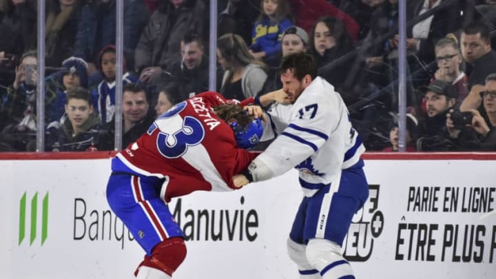 LAVAL, QC - DECEMBER 28: Michael Pezzetta #23 of the Laval Rocket and Richard Clune #17 of the Toronto Marlies fight during the first period at Place Bell on December 28, 2019 in Laval, Canada. (Photo by Minas Panagiotakis/Getty Images)