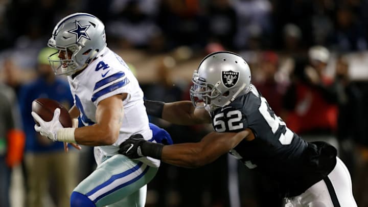 OAKLAND, CA - DECEMBER 17: Khalil Mack #52 of the Oakland Raiders sacks Dak Prescott #4 of the Dallas Cowboys during their NFL game at Oakland-Alameda County Coliseum on December 17, 2017 in Oakland, California. (Photo by Lachlan Cunningham/Getty Images)