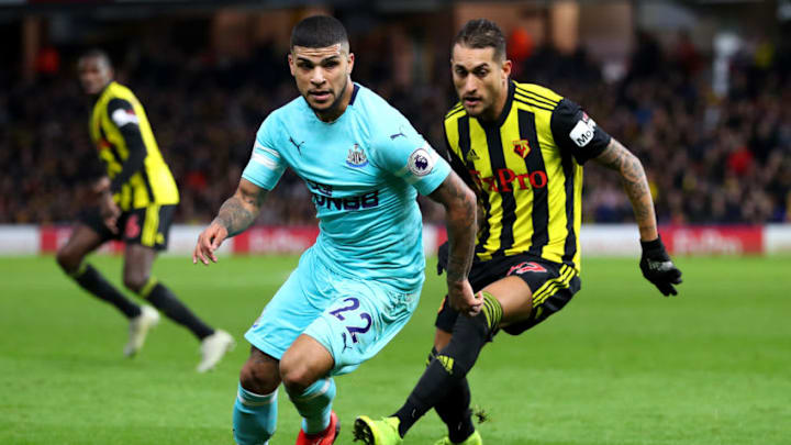 WATFORD, ENGLAND - DECEMBER 29: Deandre Yedlin of Newcastle United gets away from Roberto Pereyra of Watford during the Premier League match between Watford FC and Newcastle United at Vicarage Road on December 29, 2018 in Watford, United Kingdom. (Photo by Catherine Ivill/Getty Images)
