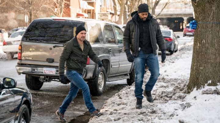 CHICAGO P.D. -- "Protect And Serve" Episode 808 -- Pictured: (l-r) Patrick John Flueger as Adam Ruzek, LaRoyce Hawkins as Kevin Atwater -- (Photo by: Matt Dinerstein/NBC)