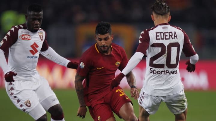 ROME, ITALY - DECEMBER 20: Emerson Palmieri (C) of AS Roma competes for the ball with Simone Edera and Ebenezer Acquah of Torino FC during the TIM Cup match between AS Roma and Torino FC at Olimpico Stadium on December 20, 2017 in Rome, Italy. (Photo by Paolo Bruno/Getty Images)