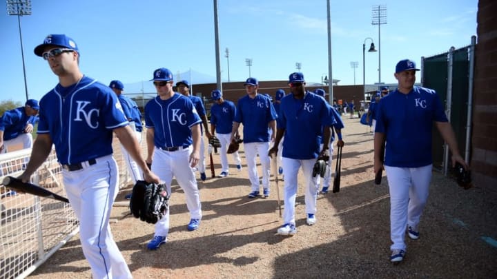 Feb 23, 2016; Surprise, AZ, USA; Kansas City Royals players walk to the field during a workout at Surprise Stadium Practice Fields. Mandatory Credit: Joe Camporeale-USA TODAY Sports