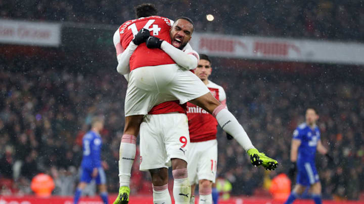LONDON, ENGLAND - JANUARY 29: Pierre-Emerick Aubameyang of Arsenal celebrates after scoring his team's first goal with Alexandre Lacazette of Arsenal during the Premier League match between Arsenal and Cardiff City at Emirates Stadium on January 29, 2019 in London, United Kingdom. (Photo by Catherine Ivill/Getty Images)