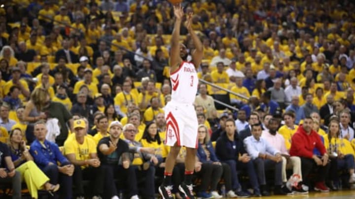 OAKLAND, CA – MAY 22: Chris Paul #3 of the Houston Rockets takes an open three-point shot against the Golden State Warriors during Game Four of the Western Conference Finals of the 2018 NBA Playoffs at ORACLE Arena on May 22, 2018 in Oakland, California. NOTE TO USER: User expressly acknowledges and agrees that, by downloading and or using this photograph, User is consenting to the terms and conditions of the Getty Images License Agreement. (Photo by Ezra Shaw/Getty Images)