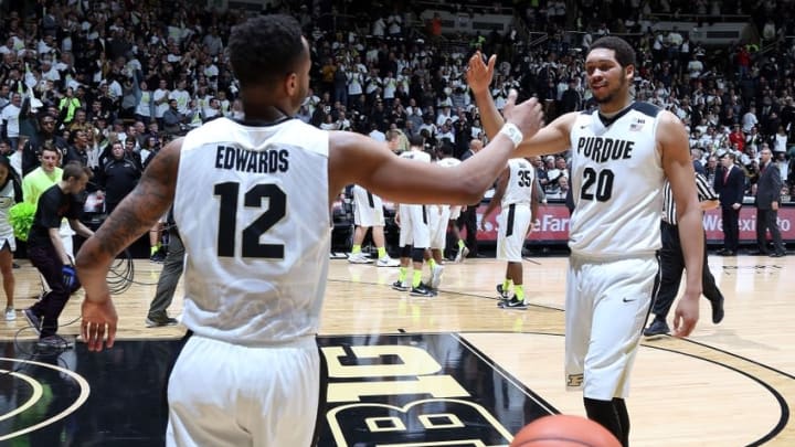 Jan 21, 2016; West Lafayette, IN, USA; Purdue Boilermakers forward Vince Edwards (12) celebrates with center A.J. Hammons (20) after the game against the Ohio State Buckeyes at Mackey Arena. Purdue defeats Ohio State 75-64. Mandatory Credit: Brian Spurlock-USA TODAY Sports