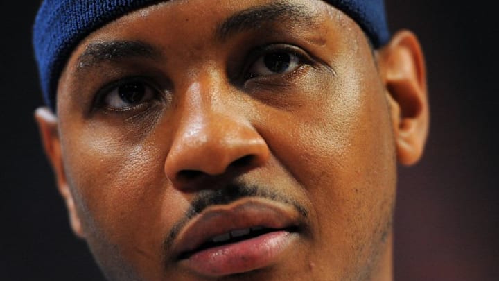 Carmelo Anthony of the US Olympic basketball team attends a training session on the eve of their warm-up match against Britain's Team GB at the Manchester Arena in Manchester, north-west England, on July 18, 2012. AFP PHOTO / ANDREW YATES (Photo credit should read ANDREW YATES/AFP/GettyImages)