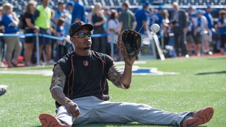 Jun 10, 2016; Toronto, Ontario, CAN; Baltimore Orioles center fielder Adam Jones (10) plays catch during batting practice before a game against the Toronto Blue Jays at Rogers Centre. The Toronto Blue Jays won 4-3. Mandatory Credit: Nick Turchiaro-USA TODAY Sports