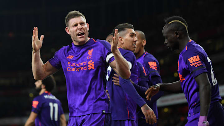 LONDON, ENGLAND - NOVEMBER 03: James Milner of Liverpool celebrates after he scores his sides first goal during the Premier League match between Arsenal FC and Liverpool FC at Emirates Stadium on November 3, 2018 in London, United Kingdom. (Photo by Michael Regan/Getty Images)