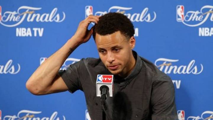 June 7, 2015; Oakland, CA, USA; Golden State Warriors guard Stephen Curry speaks to media following the 95-93 loss against the Cleveland Cavaliers in game two of the NBA Finals at Oracle Arena. Mandatory Credit: Kelley L Cox-USA TODAY Sports