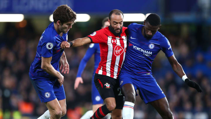 LONDON, ENGLAND – JANUARY 02: Marcos Alonso of Chelsea and Antonio Ruediger of Chelsea battle for posession with Nathan Redmond of Southampton during the Premier League match between Chelsea FC and Southampton FC at Stamford Bridge on January 2, 2019 in London, United Kingdom. (Photo by Clive Rose/Getty Images)