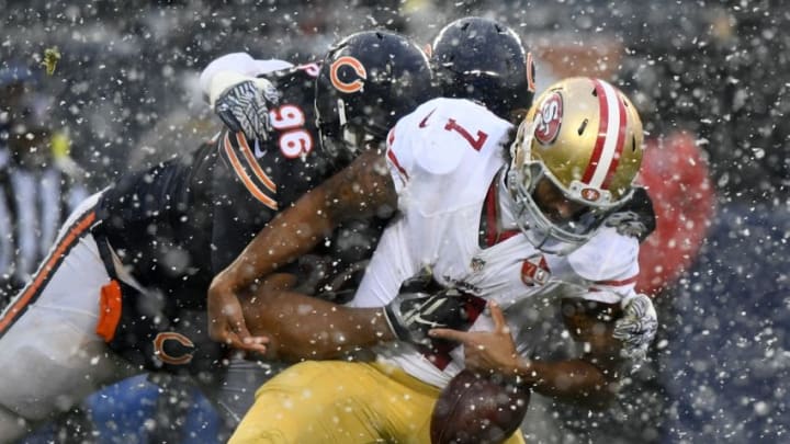 Dec 4, 2016; Chicago, IL, USA; Chicago Bears defensive end Akiem Hicks (96) knocks the ball away from San Francisco 49ers quarterback Colin Kaepernick (7) during the second half at Soldier Field. Mandatory Credit: Mike DiNovo-USA TODAY Sports