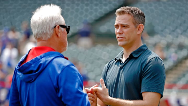 CHICAGO, IL - JULY 03: Chicago Cubs President of Baseball Operations Theo Epstein talks with manager Joe Maddon