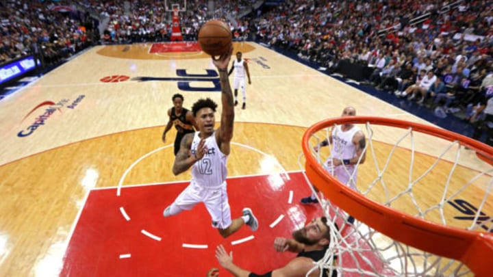 WASHINGTON, DC – APRIL 27: Kelly Oubre Jr. #12 of the Washington Wizards shoots against the Toronto Raptors in the first half during Game Six of Round One of the 2018 NBA Playoffs at Capital One Arena on April 27, 2018 in Washington, DC. NOTE TO USER: User expressly acknowledges and agrees that, by downloading and or using this photograph, User is consenting to the terms and conditions of the Getty Images License Agreement. (Photo by Patrick Smith/Getty Images)