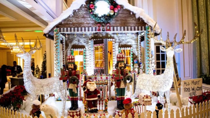 A life sized version of a Gingerbread House built by staff at the Ritz Carlton, Naples including Executive Pastry Chef Lerome Campbell is on display in the lobby of the hotel. It was part of a 'Welcome to Christmas' display. Viewing of the house is open to public and will last until Christmas. Among some of the ingredients that it is built with are 1200 gingerbread bricks, 240 lbs of sugar, 756 lbs of flour, 60,000 pieces of candy and tons of love.Gingers002