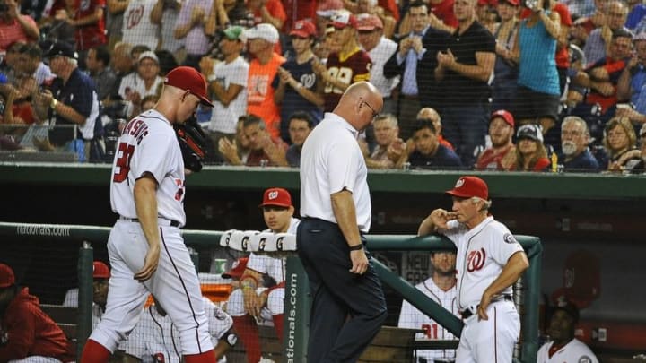 Sep 7, 2016; Washington, DC, USA; Washington Nationals starting pitcher Stephen Strasburg (37) is removed from the game with an apparent right arm injury during the second inning against the Atlanta Braves at Nationals Park. Mandatory Credit: Brad Mills-USA TODAY Sports