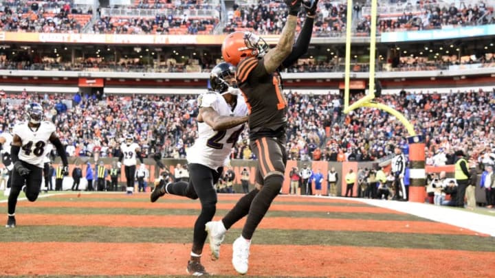 CLEVELAND, OHIO - DECEMBER 22: Odell Beckham Jr. #13 of the Cleveland Browns catches a touchdown pass against Marcus Peters #24 of the Baltimore Ravens during the fourth quarter in the game at FirstEnergy Stadium on December 22, 2019 in Cleveland, Ohio. (Photo by Jason Miller/Getty Images)
