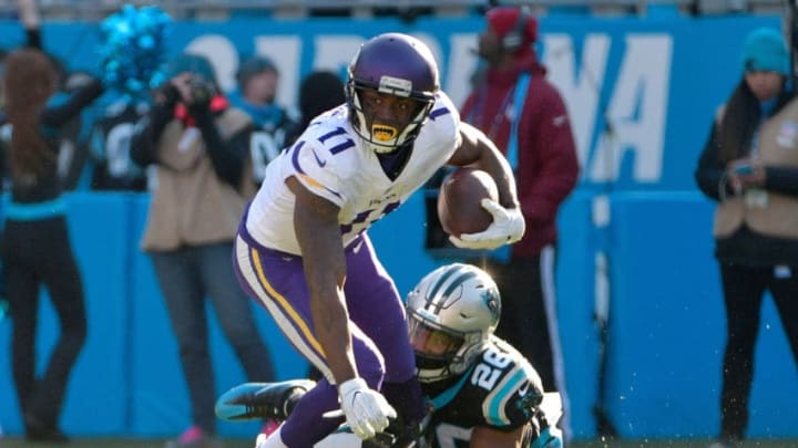 CHARLOTTE, NC - DECEMBER 10: Daryl Worley #26 of the Carolina Panthers tackles Laquon Treadwell #11 of the Minnesota Vikings during their game at Bank of America Stadium on December 10, 2017 in Charlotte, North Carolina. (Photo by Grant Halverson/Getty Images)