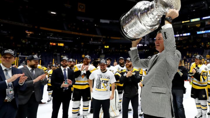 NASHVILLE, TN - JUNE 11: Pittsburgh Penguins owner Mario Lemieux raises the Stanley Cup Trophy after they defeated the Nashville Predators 2-0 in Game Six of the 2017 NHL Stanley Cup Final at the Bridgestone Arena on June 11, 2017 in Nashville, Tennessee. (Photo by Bruce Bennett/Getty Images)