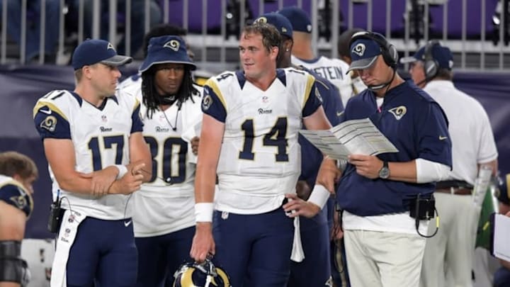 Sep 1, 2016; Minneapolis, MN, USA; Los Angeles Rams quarterback Case Keenum (17), running back Todd Gurley (30), quarterback Sean Mannion (14) and quarterbacks coach Chris Weinke react on the sidelines against the Minnesota Vikings during a NFL game at U.S. Bank Stadium. Mandatory Credit: Kirby Lee-USA TODAY Sports