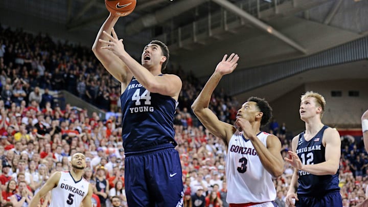 Feb 25, 2017; Spokane, WA, USA; Brigham Young Cougars center Corbin Kaufusi (44) makes a basket against Gonzaga Bulldogs forward Johnathan Williams (3) during the second half at McCarthey Athletic Center. The Cougars beat the Bulldogs 79-71. Mandatory Credit: James Snook-USA TODAY Sports